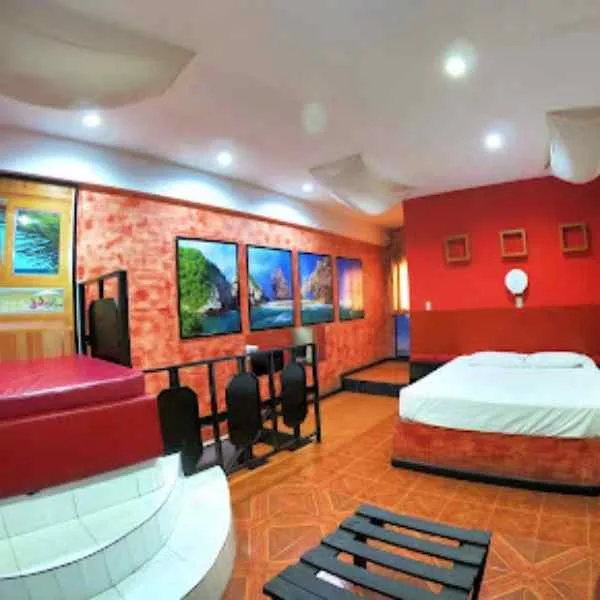 Auto Hotel Honey habitación con jacuzzi