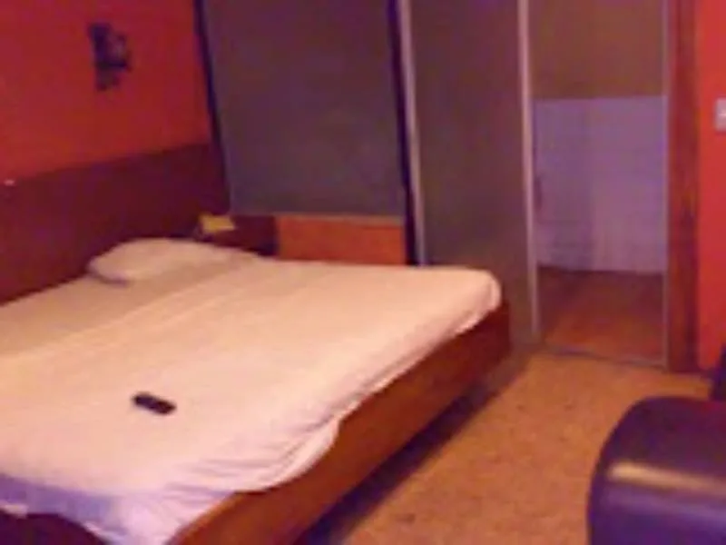 Auto Motel El Conquistador cama